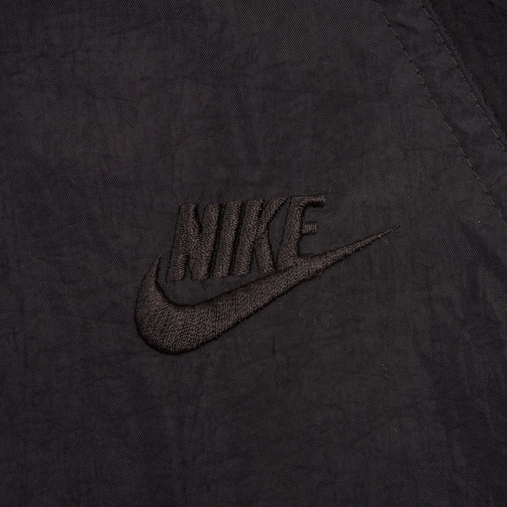 VINTAGE NIKE CLASSIC SWOOSH BLACK NYLON TRACK PANTS EARLY 1990S SIZE LARGE