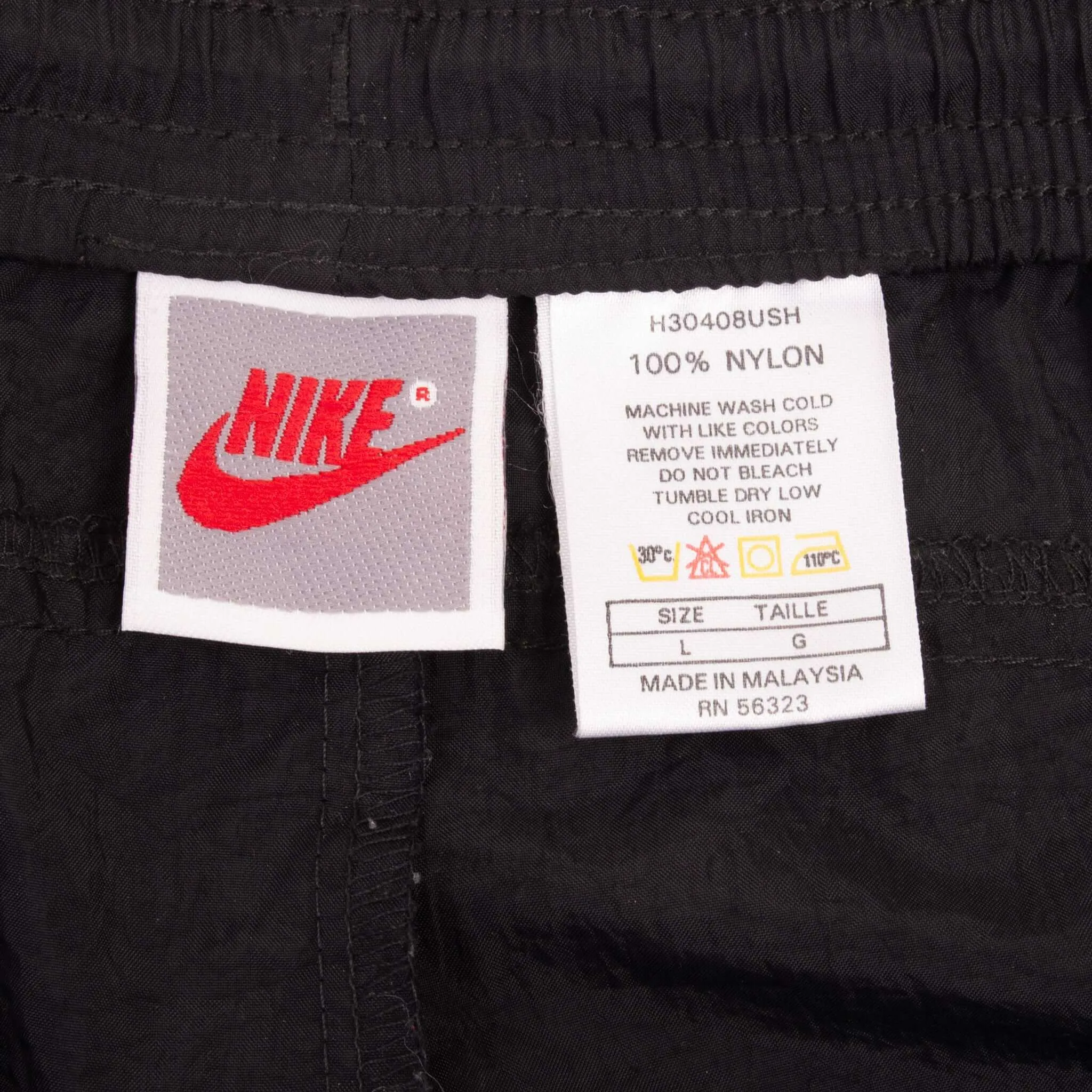 VINTAGE NIKE CLASSIC SWOOSH BLACK NYLON TRACK PANTS EARLY 1990S SIZE LARGE